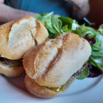 Andreoli Italian Grocer signature dishes Porchetta SandwichHouse-Made PastasTiramisu